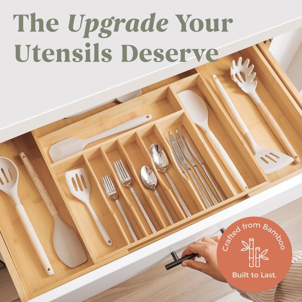 Expandable bamboo drawer organizer with 11 compartments for utensils.
